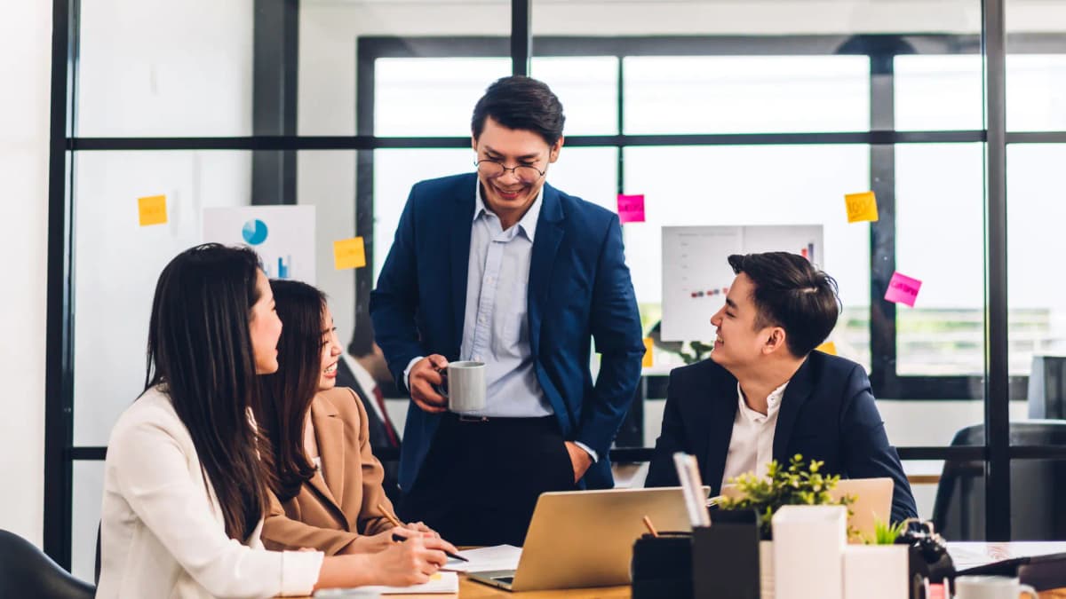 Professional team meeting discussing leadership solutions